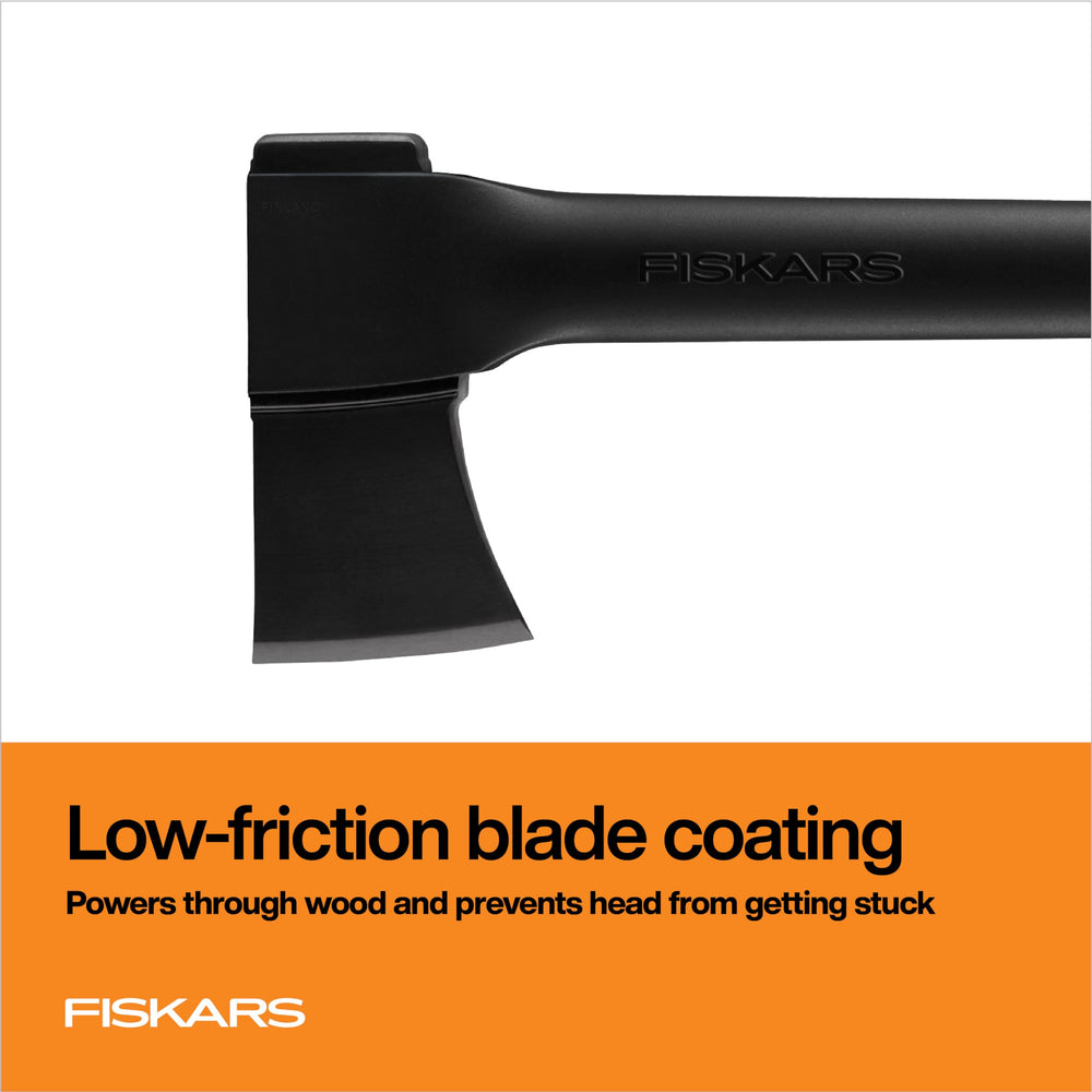 Fiskars axe in use chopping a log demonstrating efficient wood removal