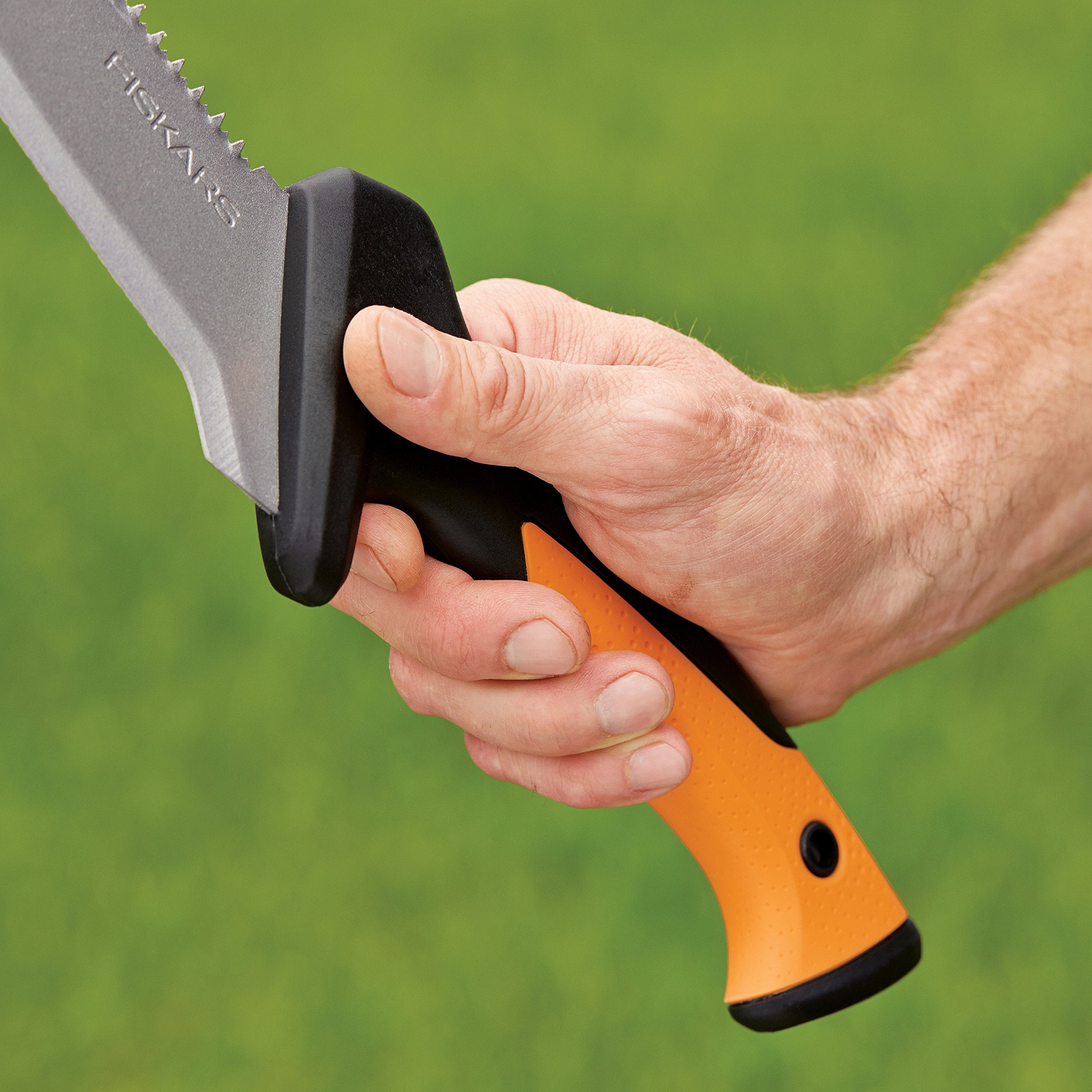 Fiskars saw packaging and label showing product info and lifetime warranty