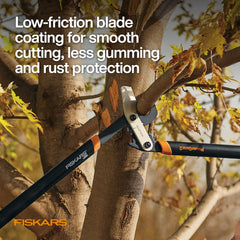 Fiskars lopper cutting a green branch to show clean, efficient action