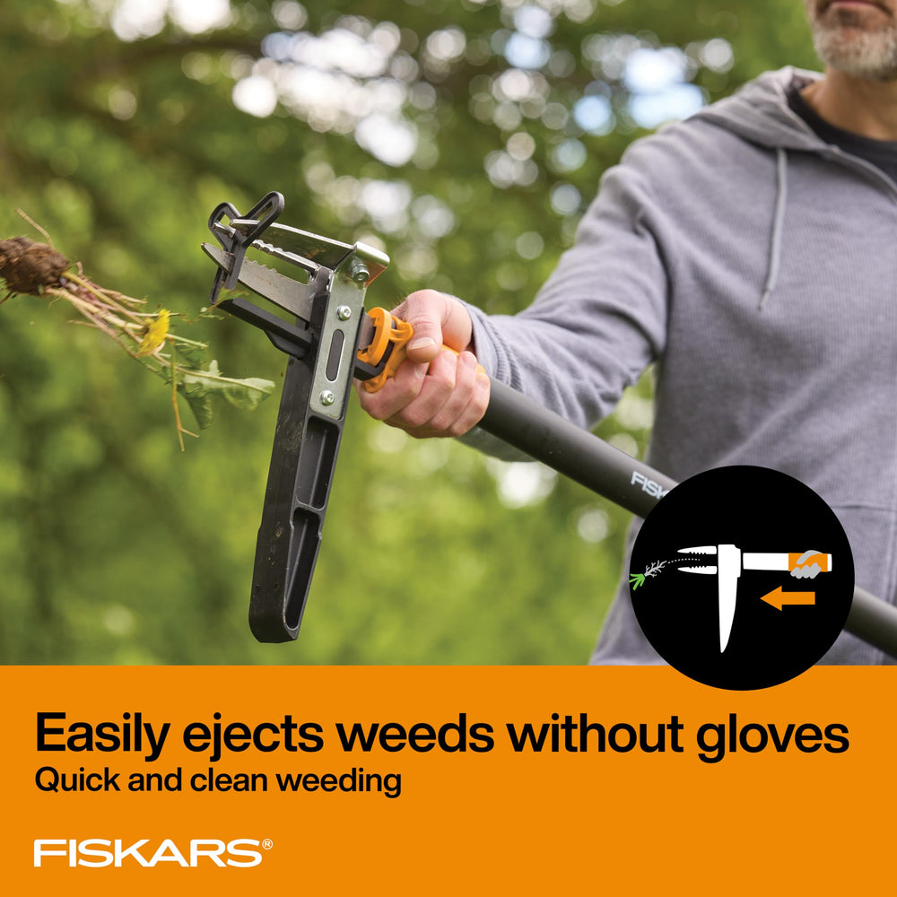 Fiskars easy-eject mechanism closeup clearing weeds quickly and cleanly