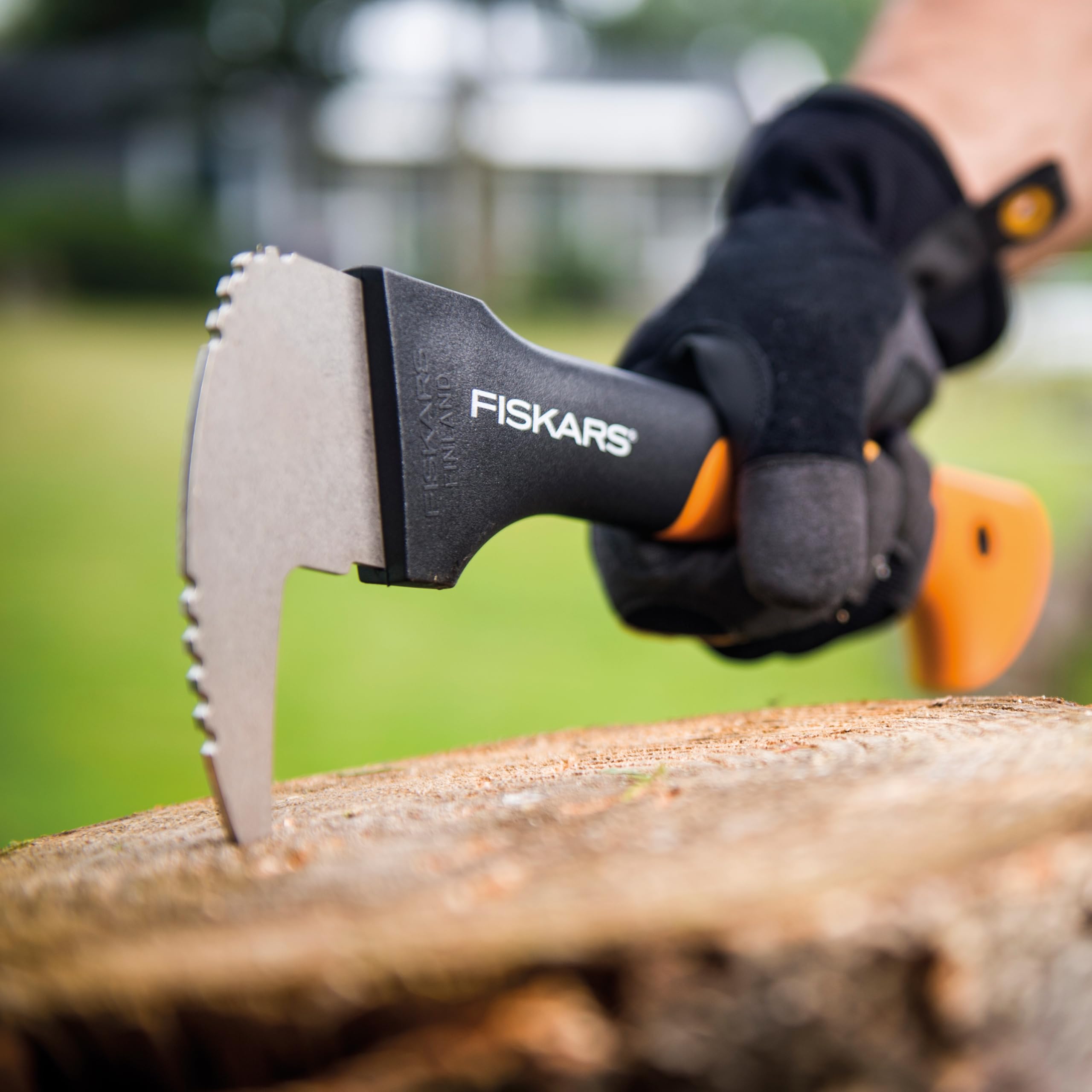 Fiskars Hookaroon beside a gloved hand to show scale and controlled leverage