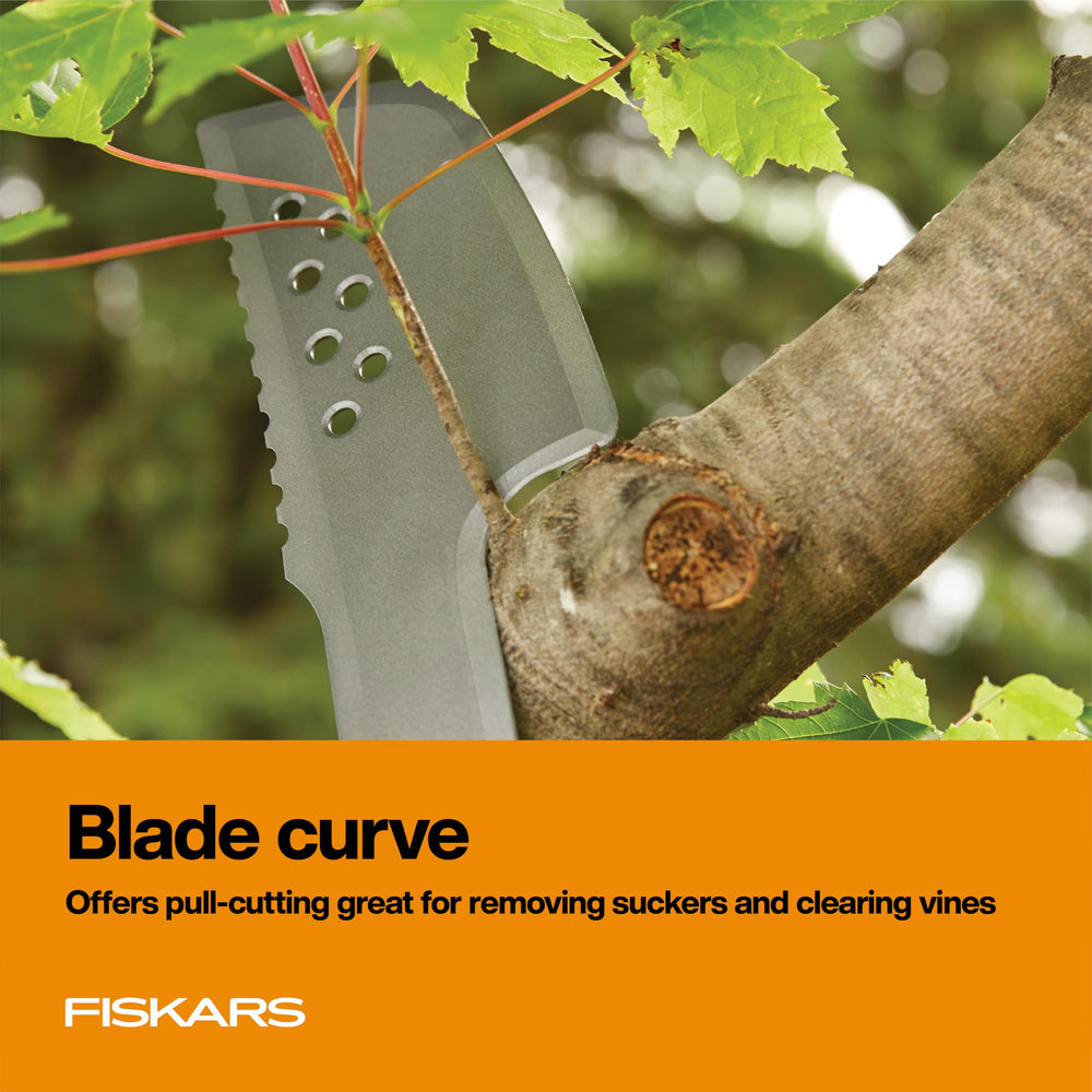 Fiskars swinging through dense brush demonstrating cutting efficiency and speed