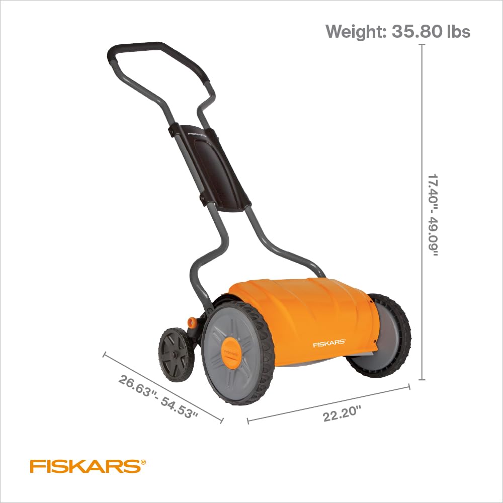 Fiskars mower in use on suburban lawn showing quiet operation and eco-friendly benefit