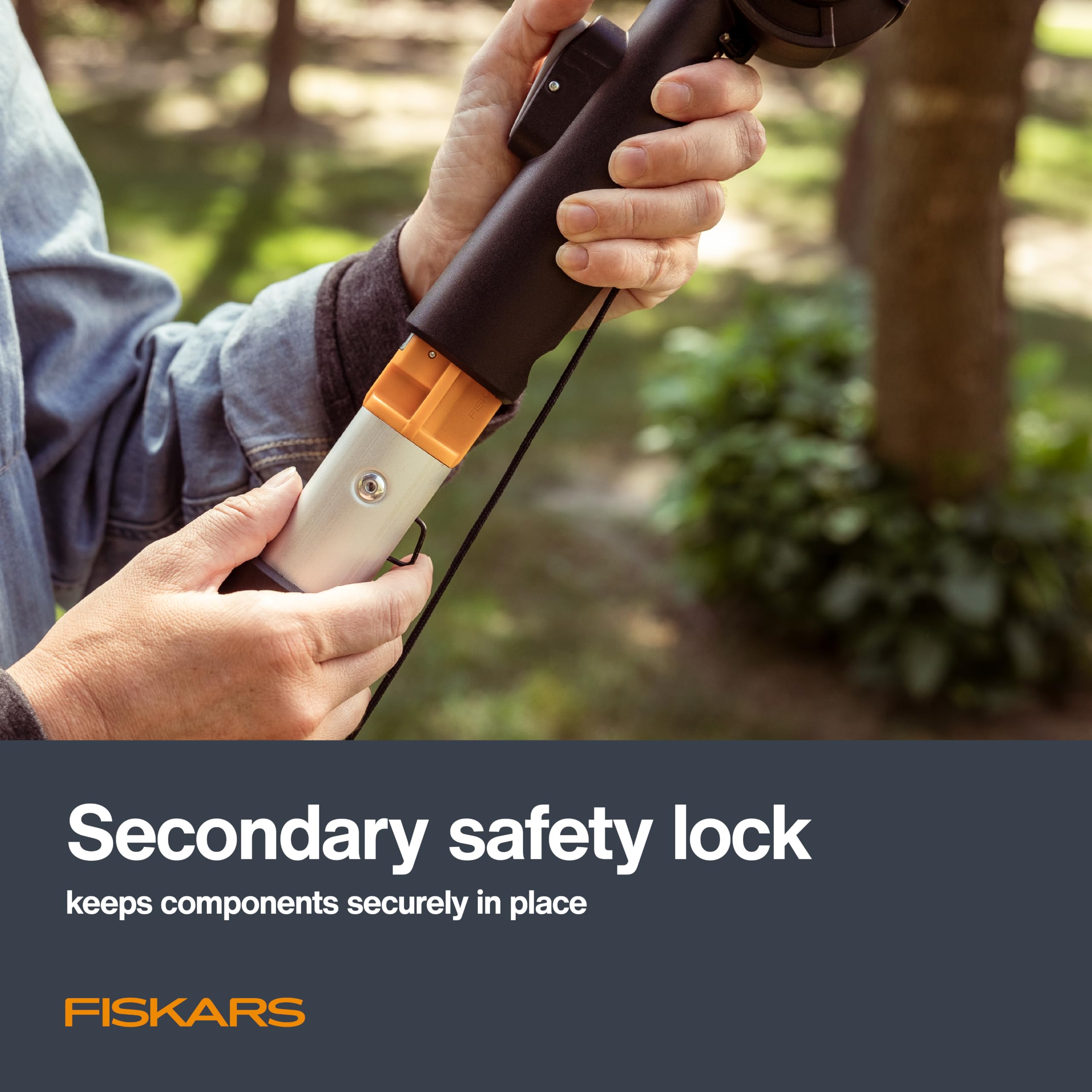Fiskars product packaging and included pruner head and automatic cord reel components
