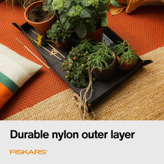 Fiskars repotting mat close-up of water-resistant nylon texture for easy cleaning