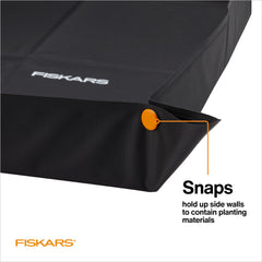 Fiskars repotting mat corner snaps raised to contain soil and prevent spills
