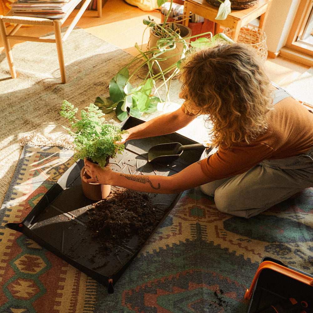 Fiskars repotting mat folded compact for easy storage and portability