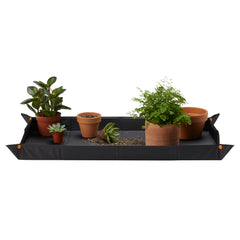 Fiskars repotting mat unfolded showing full workspace and surface protection