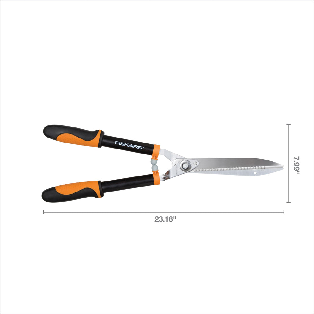 Fiskars serrated blade gripping woody stem for secure, clean cuts