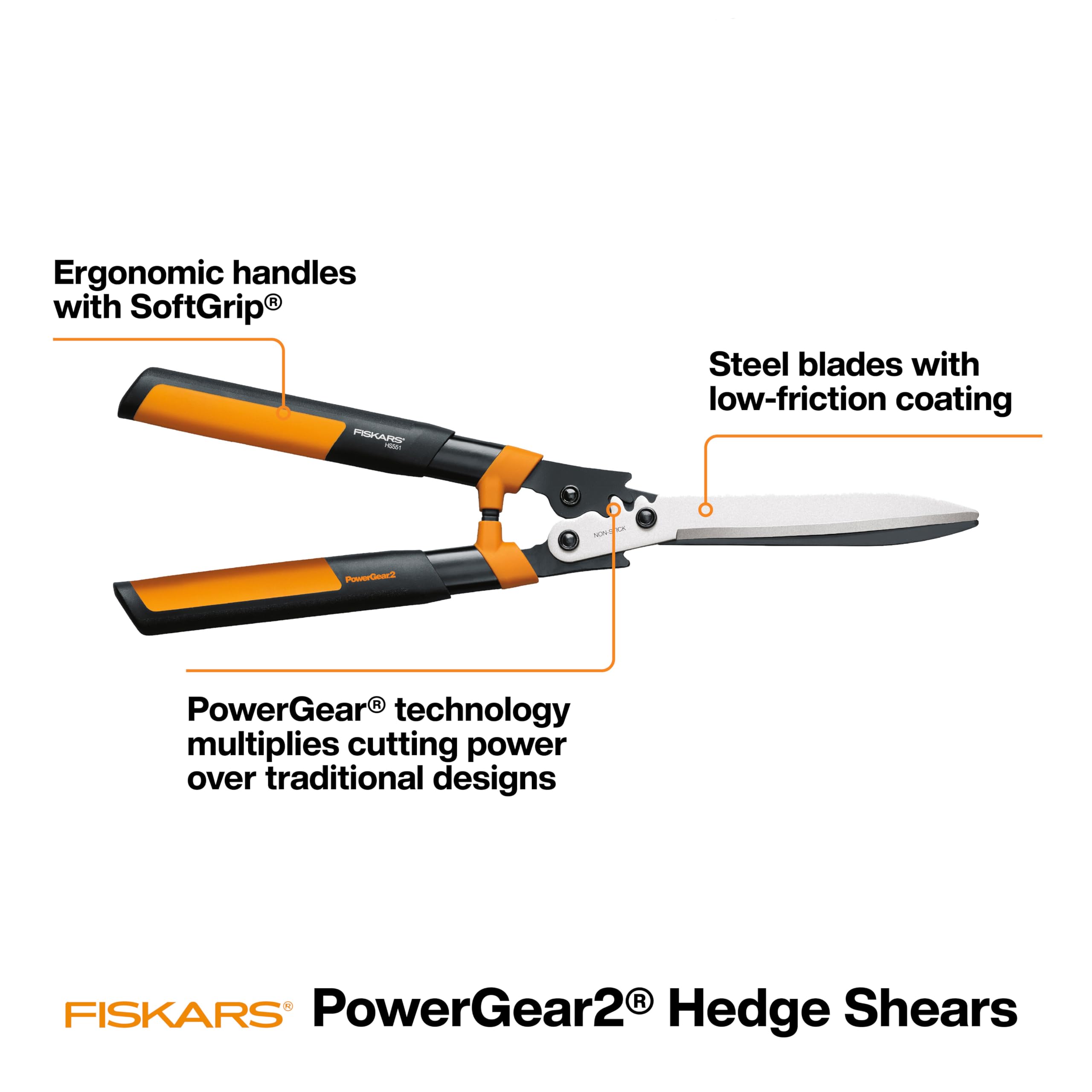 Fiskars shears in use trimming a hedge showing precise shaping benefit