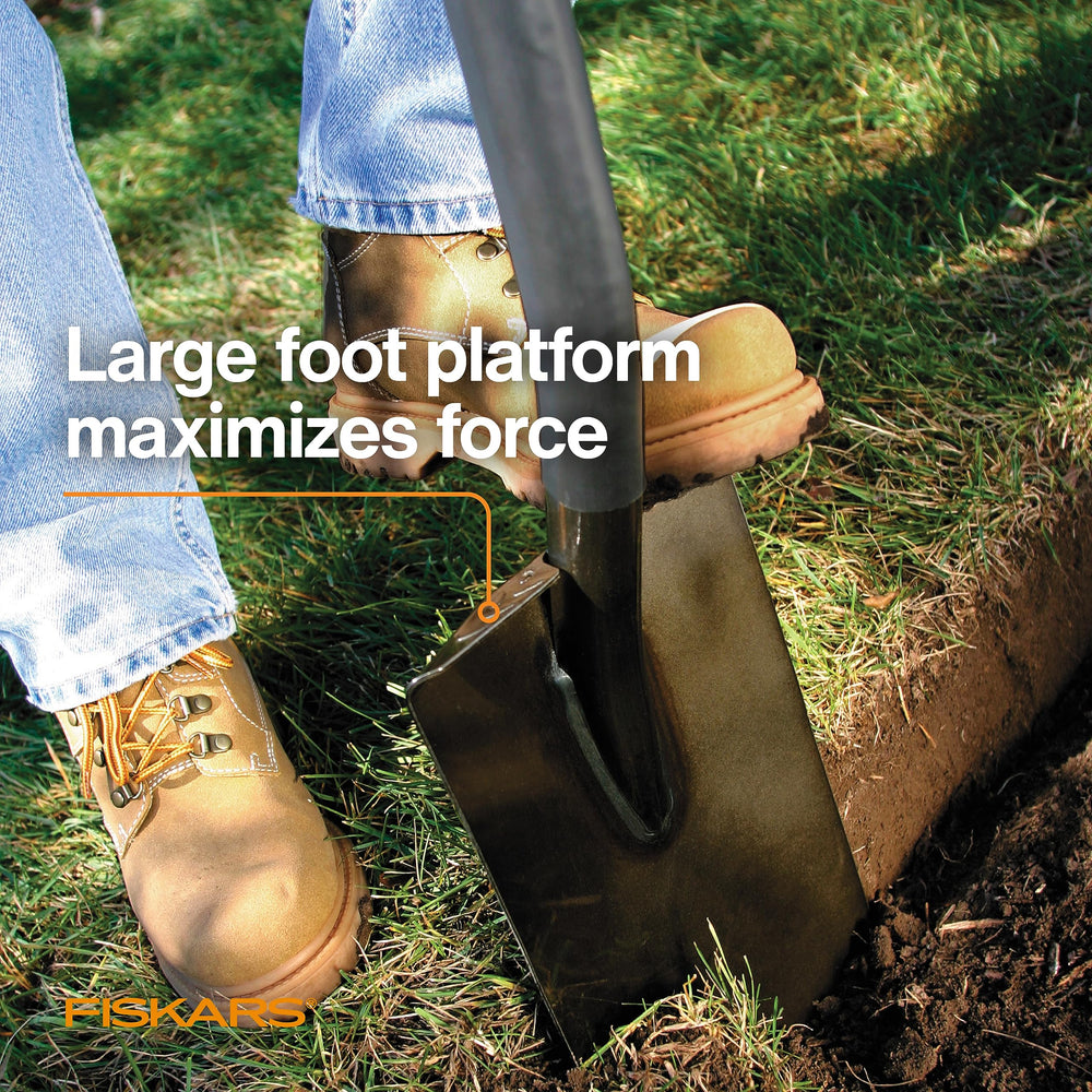 Fiskars shovel cutting compact clay demonstrating strength and easier penetration