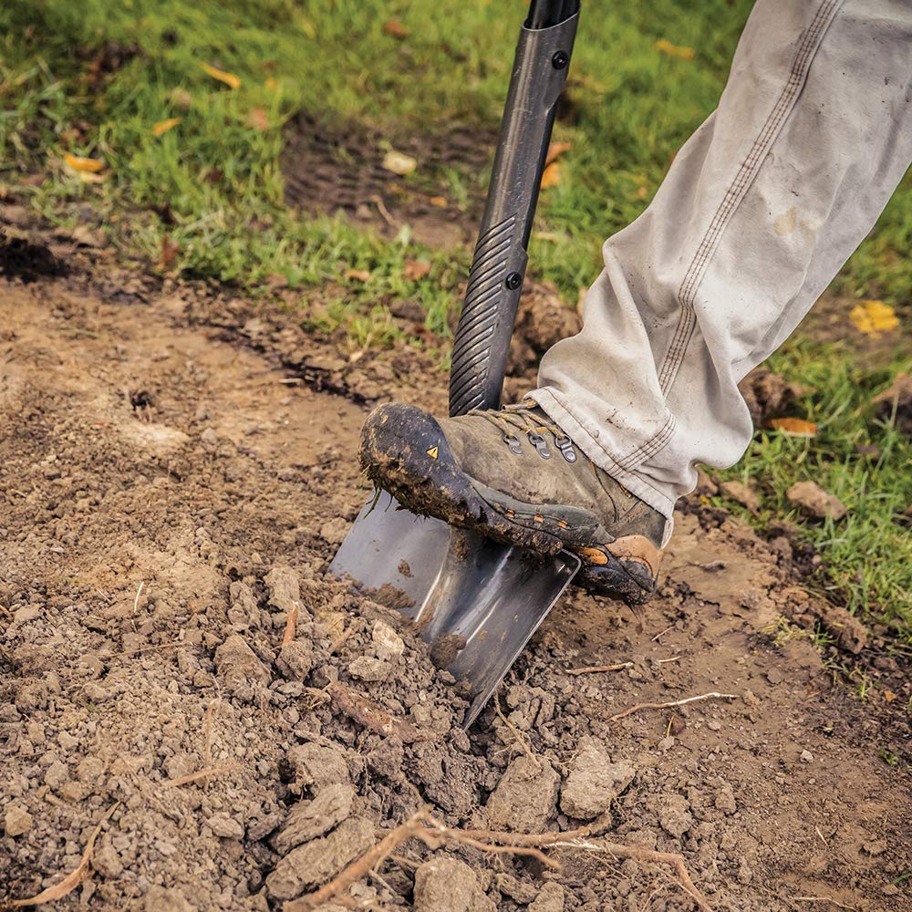 Fiskars shovel next to boot showing length and leverage advantage