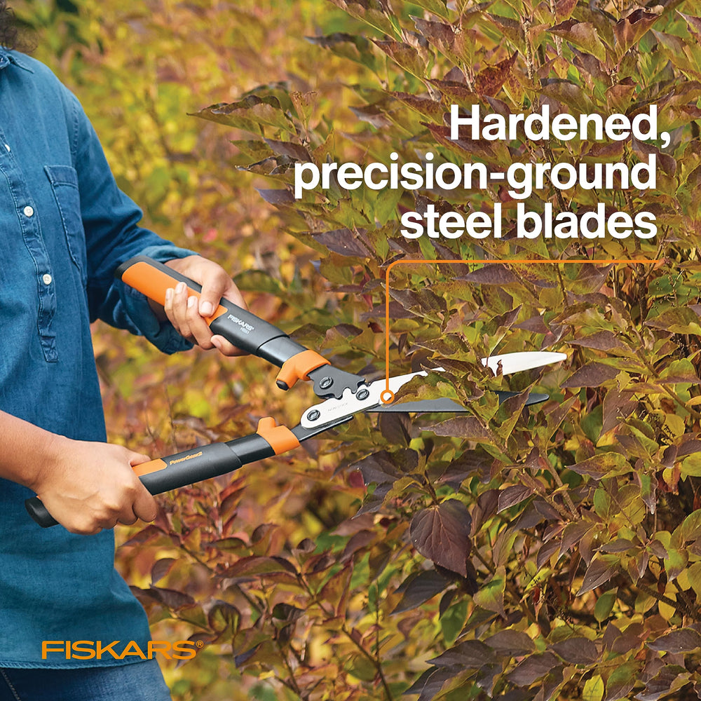 Fiskars shears beside ruler showing 23 inch scale for accurate reach benefit