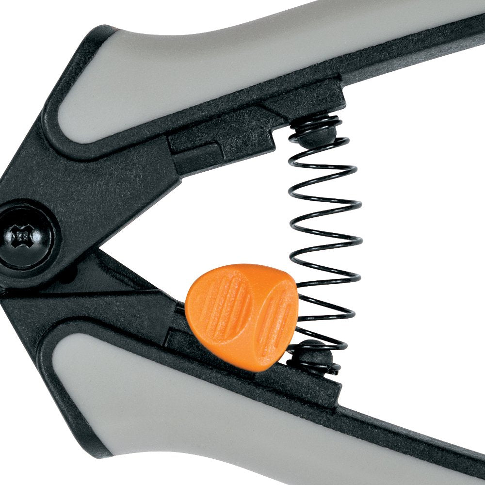 Fiskars snips trimming a rosebud demonstrating control and ease