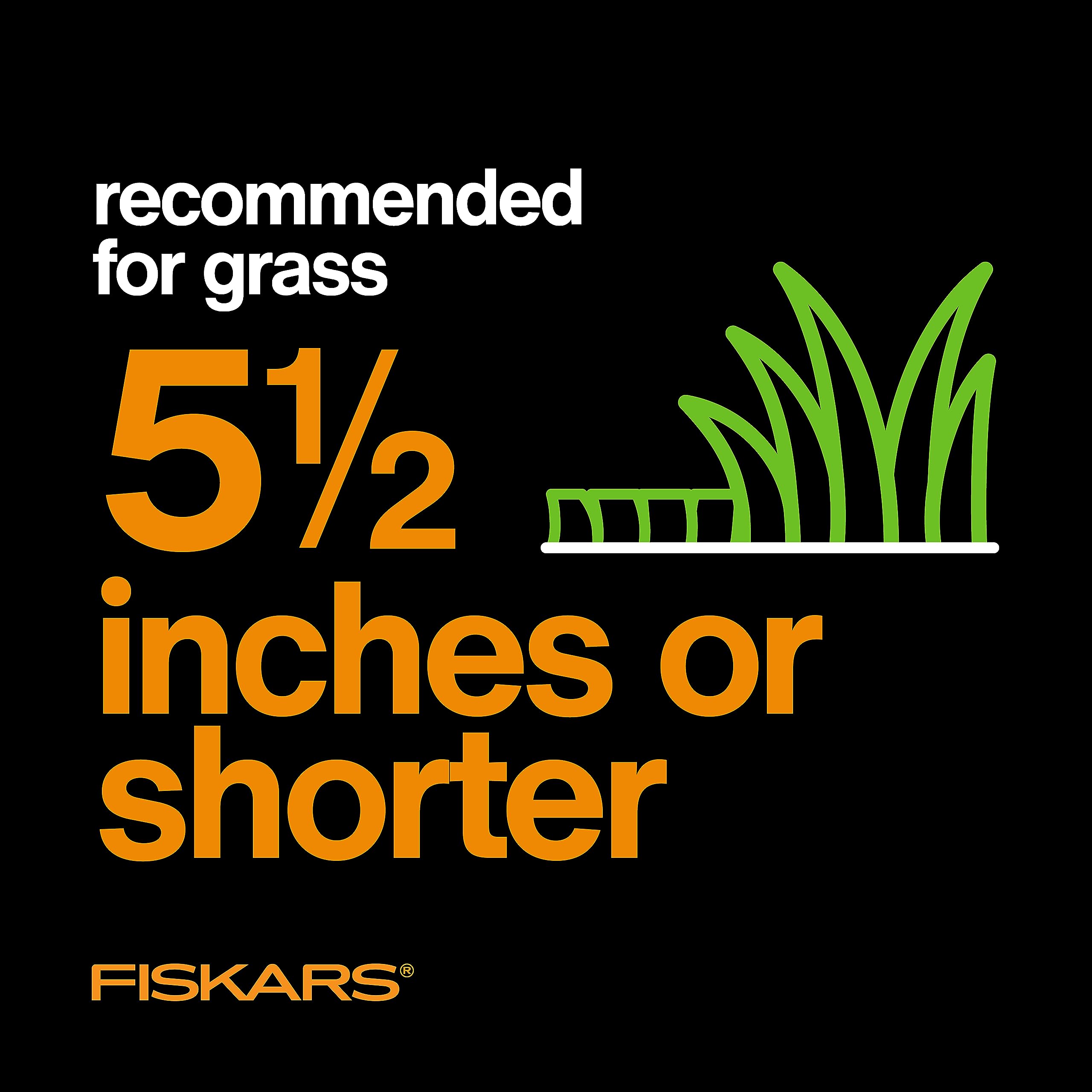 Fiskars mower with folded handle for compact storage and space-saving convenience