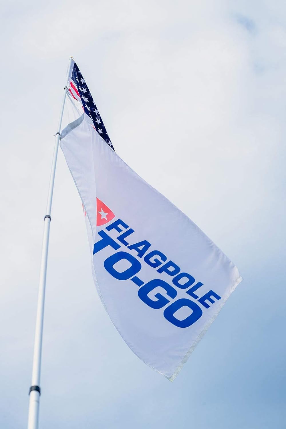 Flagpole-To-Go adjustable clip and flag detail enabling dual flags