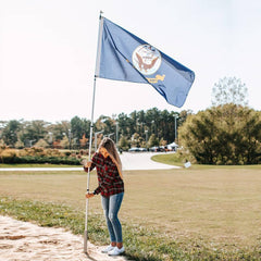 Flagpole-To-Go in use at a tailgate showing portable display advantage