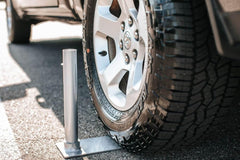 Flagpole-To-Go tire mount installed on wheel, fast no-drill setup and reliable hold
