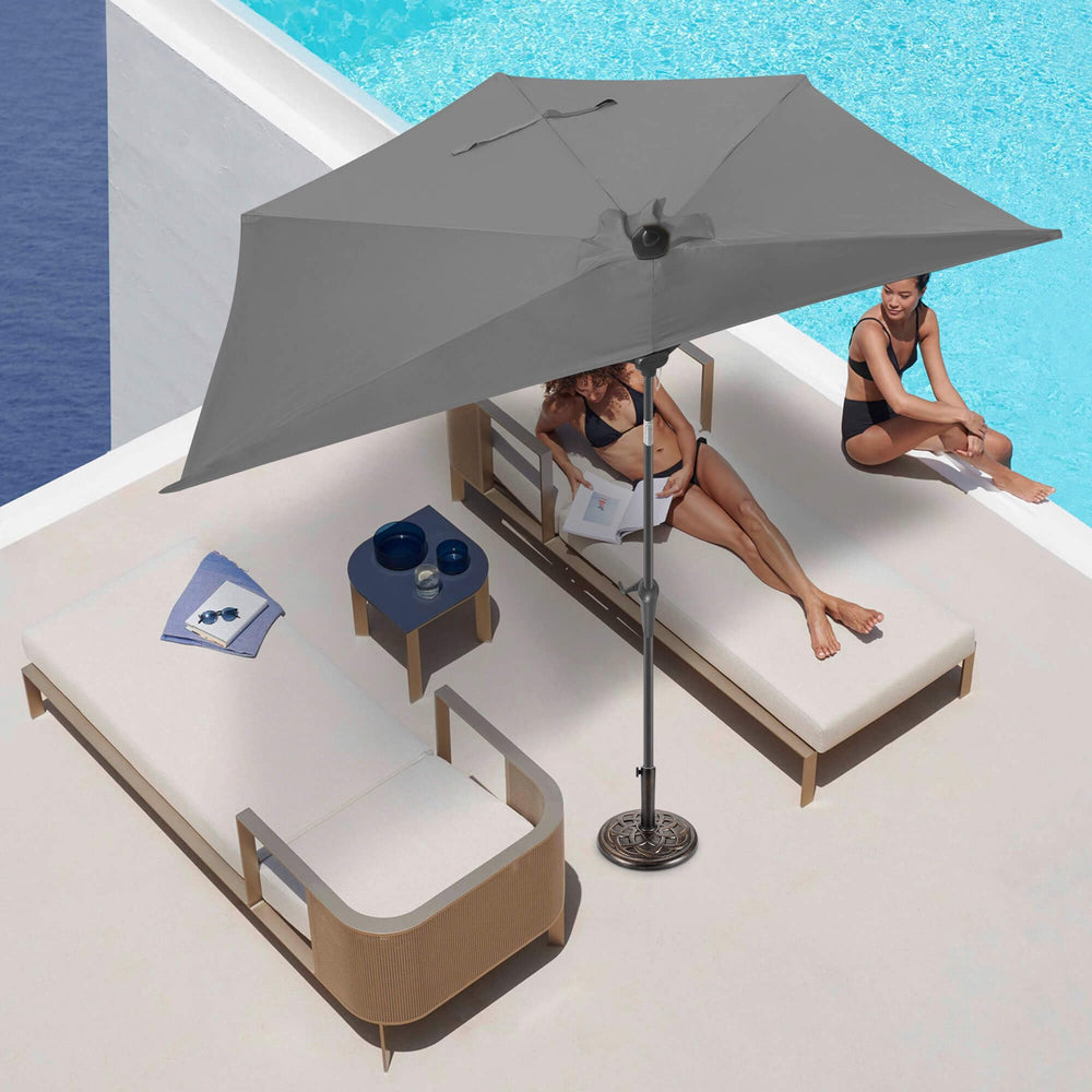 FLAME&SHADE half umbrella mounted beside RV for compact shade