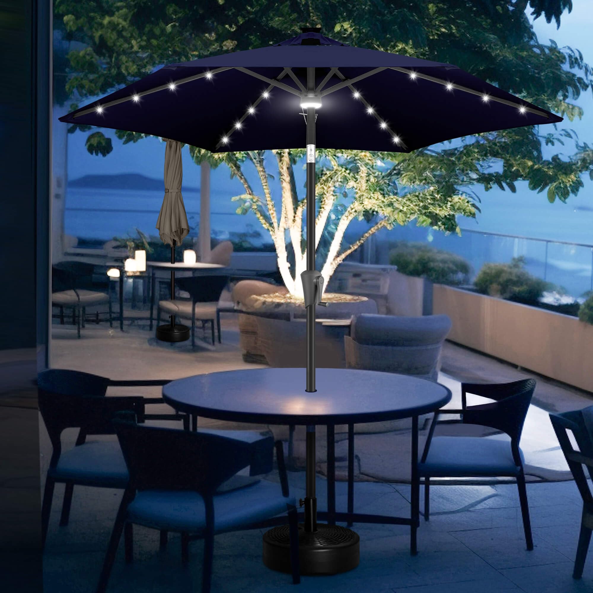 FLAME&SHADE umbrella next to table to show 7.5 ft coverage and scale