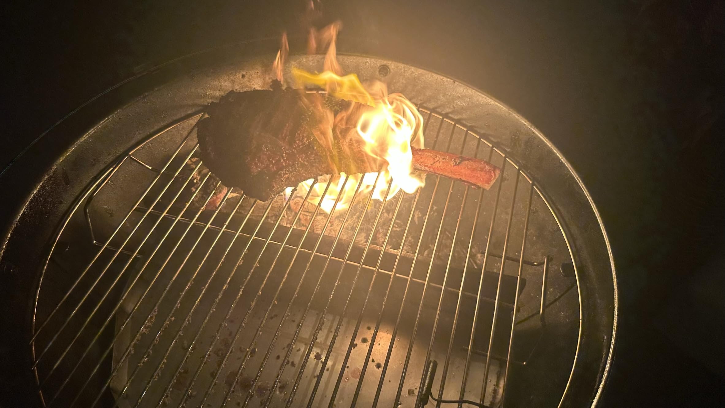 FlameTechGrills drip tray collecting grease for easier cleanup and safer grilling