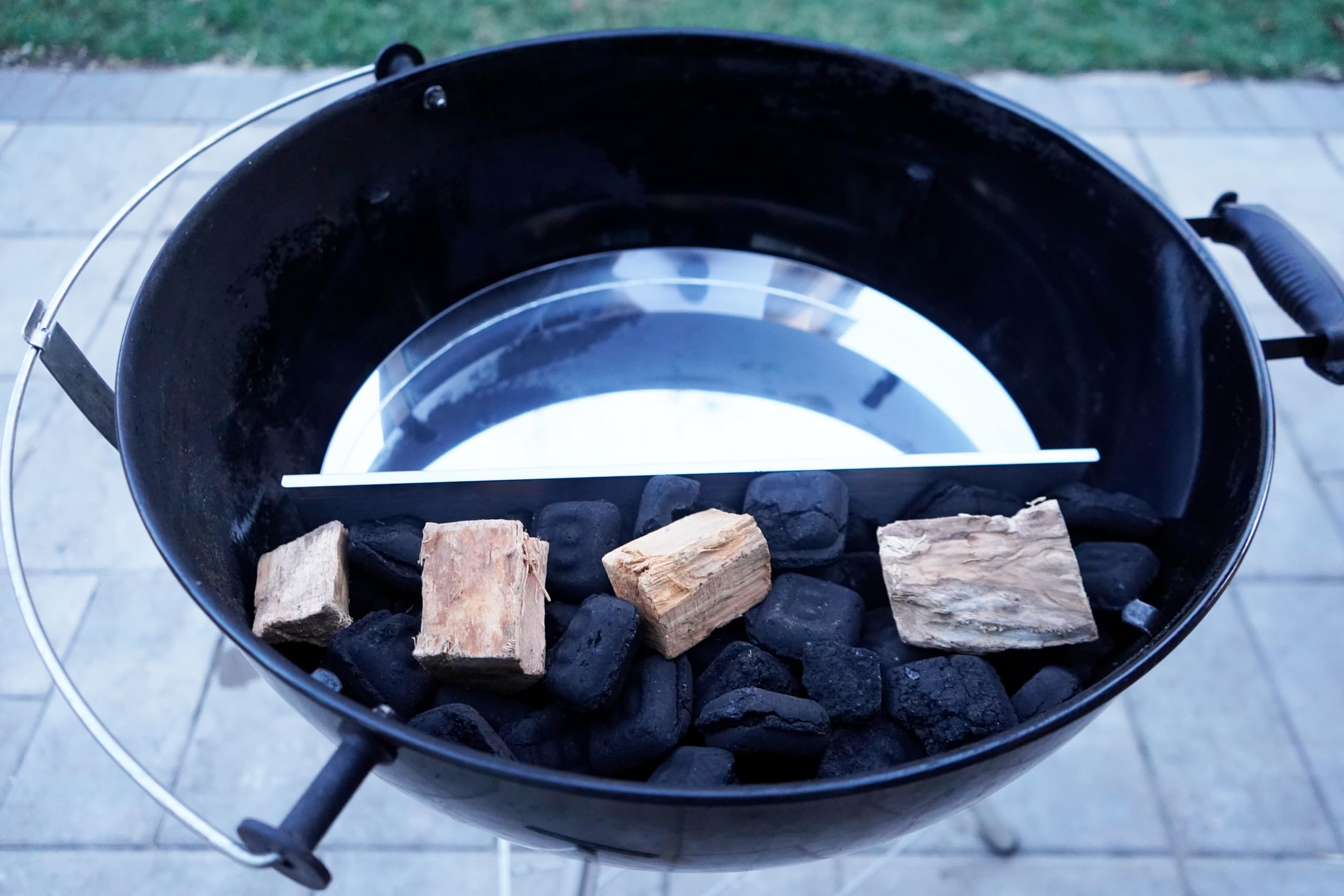 FlameTechGrills installed inside 22" kettle illustrating offset-style smoke flow benefit