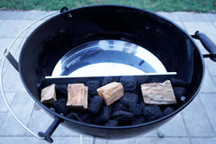 FlameTechGrills installed inside 22" kettle illustrating offset-style smoke flow benefit