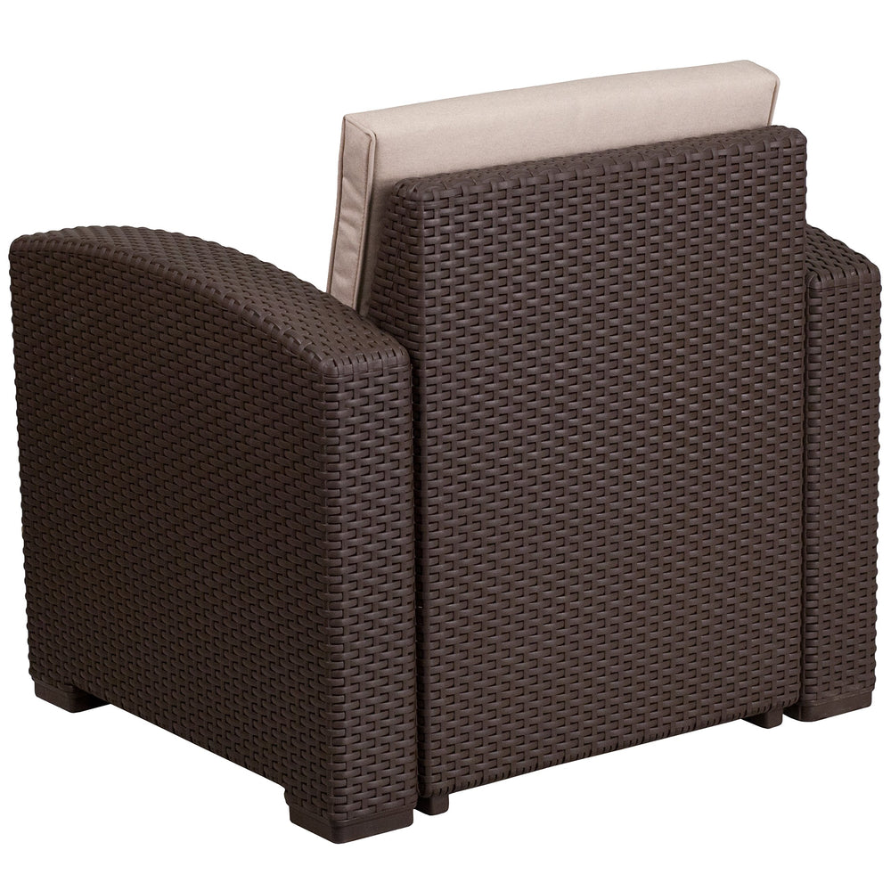 Flash Furniture chair in use with person reading showcasing comfortable outdoor lounging