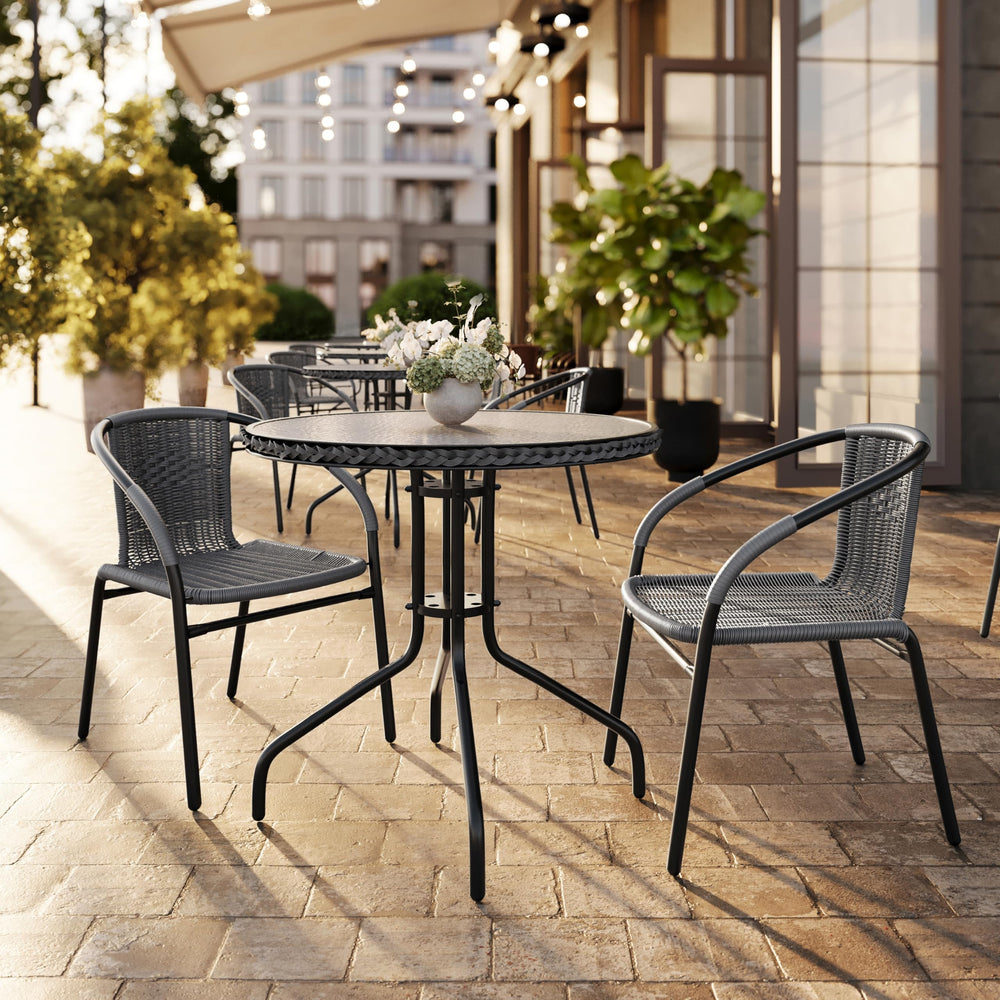 Flash Furniture lifestyle patio scene showing weather-ready seating for outdoor dining