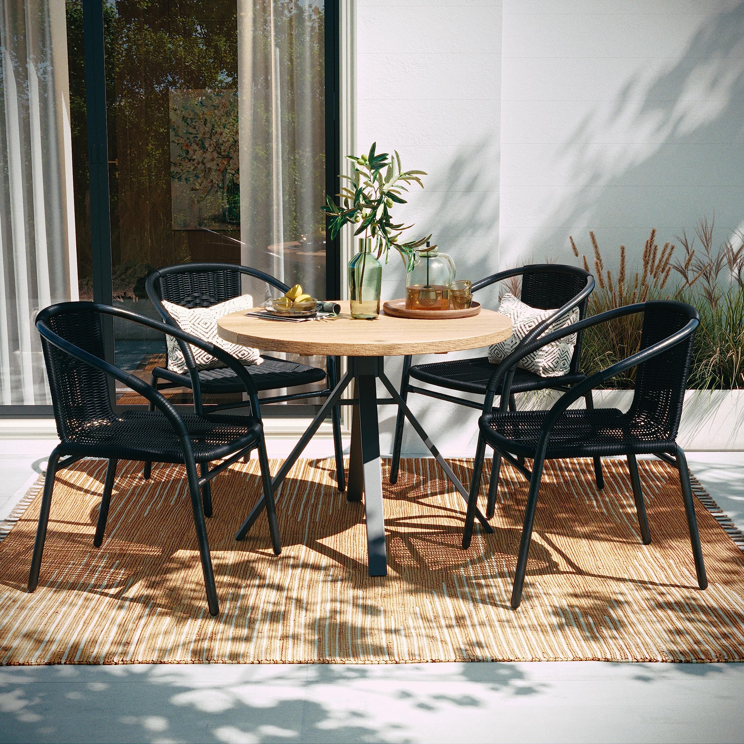 Flash Furniture Lila side profile highlighting curved back and integrated armrests for comfort