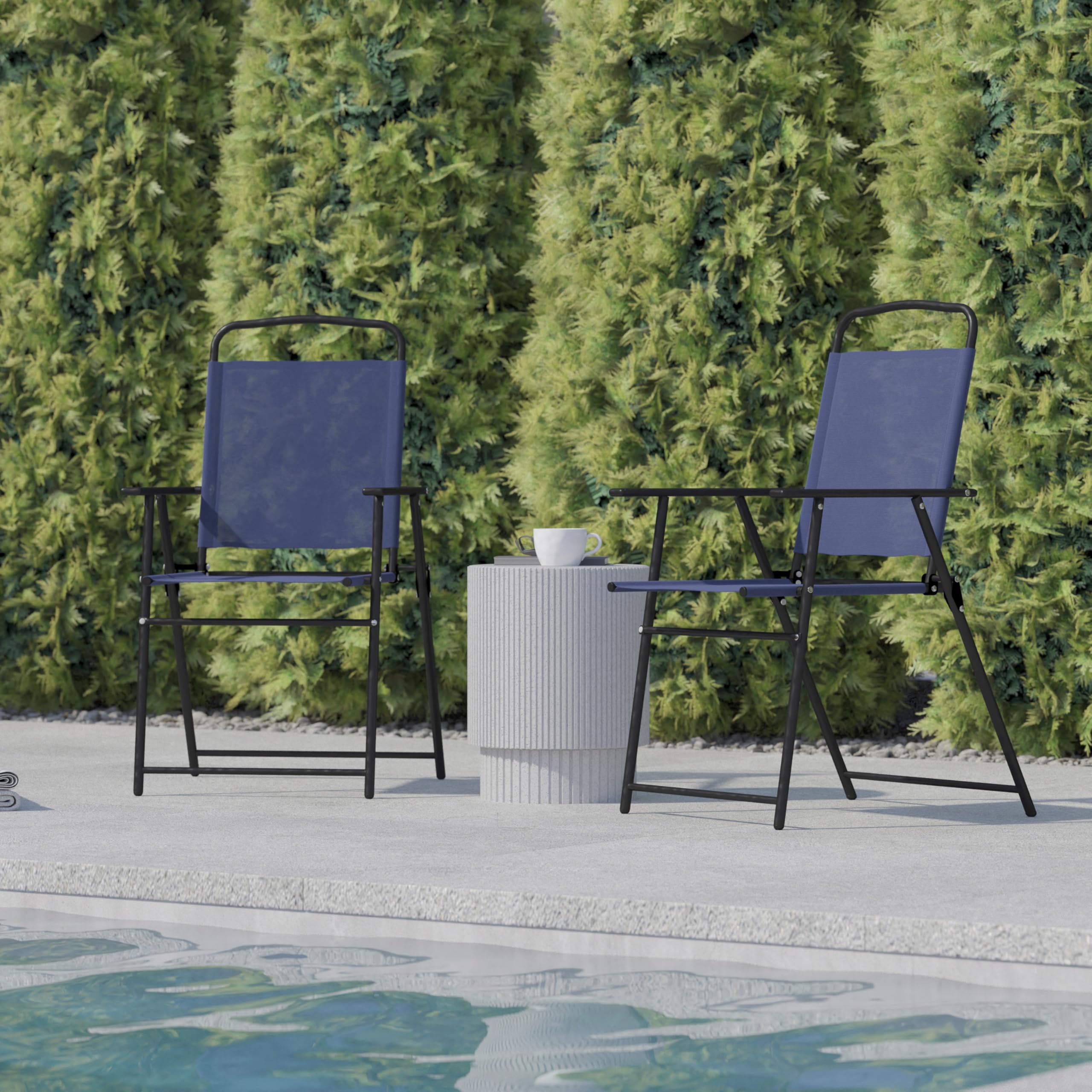 Flash Furniture chair with person for scale showing suitable seating dimensions