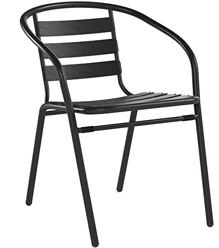 Flash Furniture chairs around patio table in restaurant setting showcasing style and durability