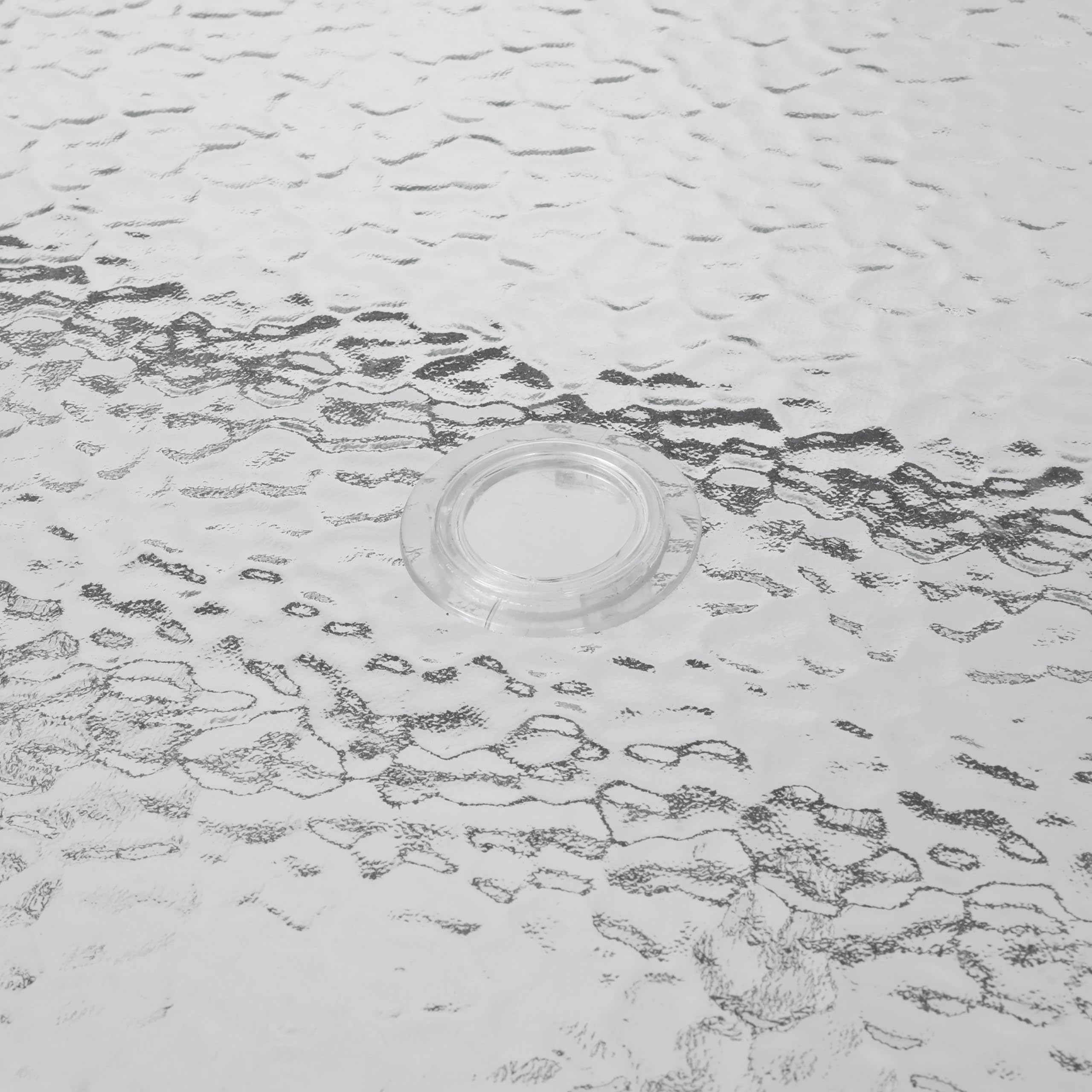 Flash Furniture rippled glass texture close-up showing tactile finish and spill-resistance benefit