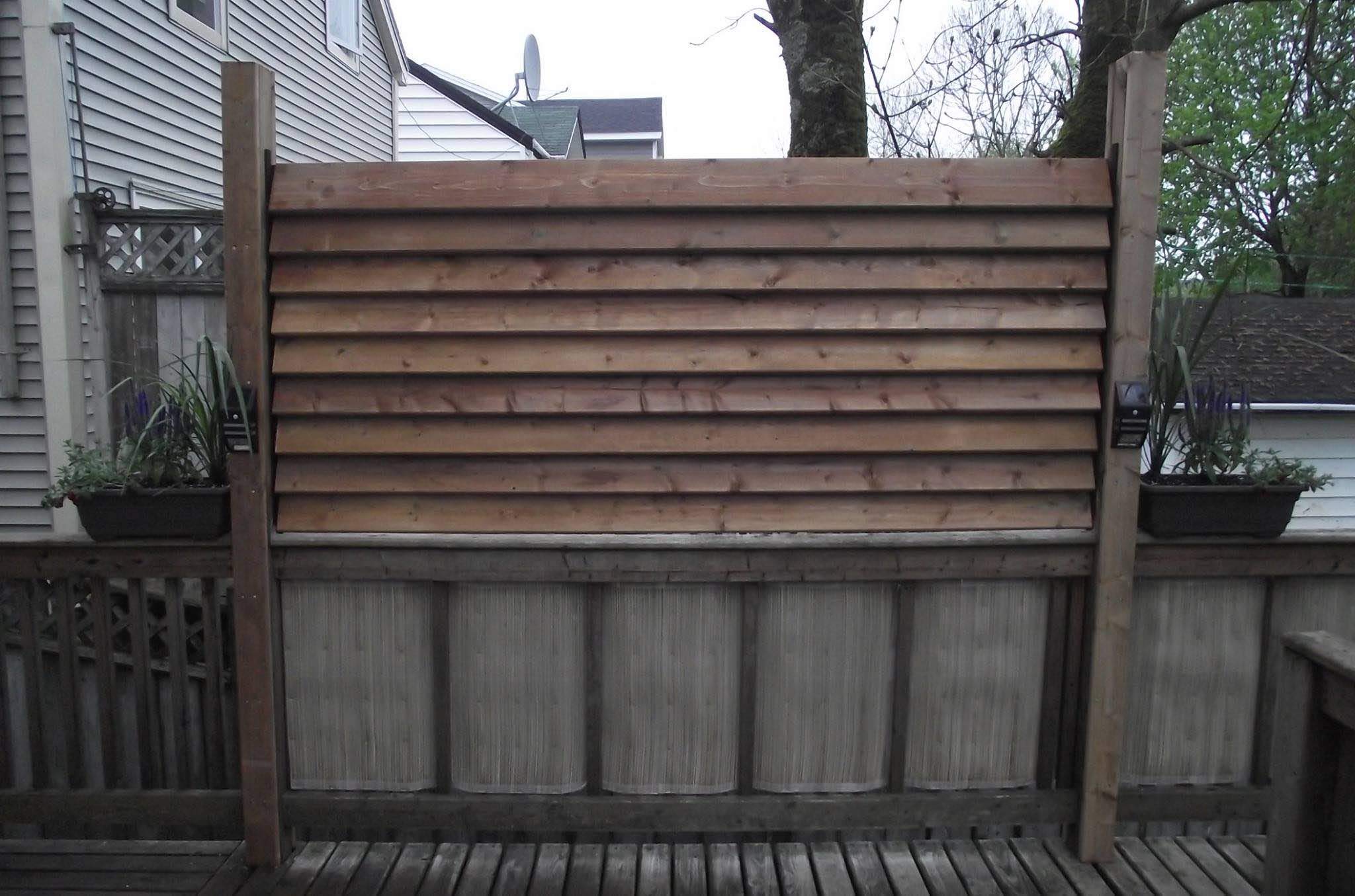Flex-Fence grouped around plant bed creating neat, protected garden edging
