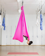 F.Life aerial hammock in use demonstrating safe inversion support and spinal decompression