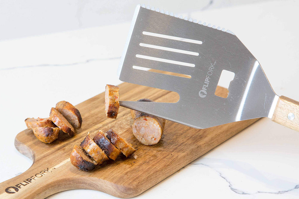 FLIPFORK Boss flipping burger on grill for efficient cooking benefit