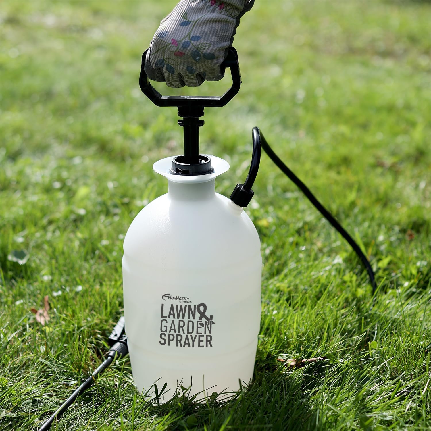 Flo-Master sprayer in garden demonstrating targeted plant care benefits