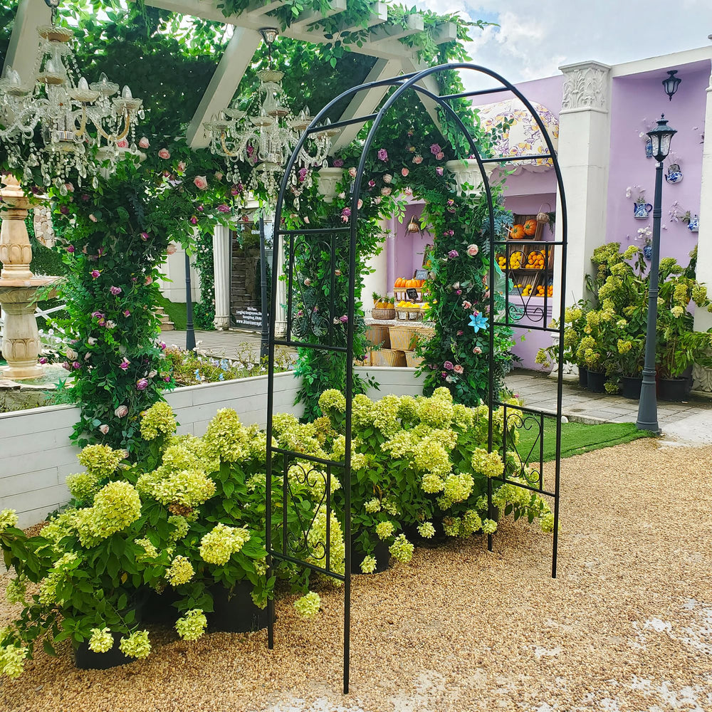 Flohover arch installed in backyard patio creating focal garden space