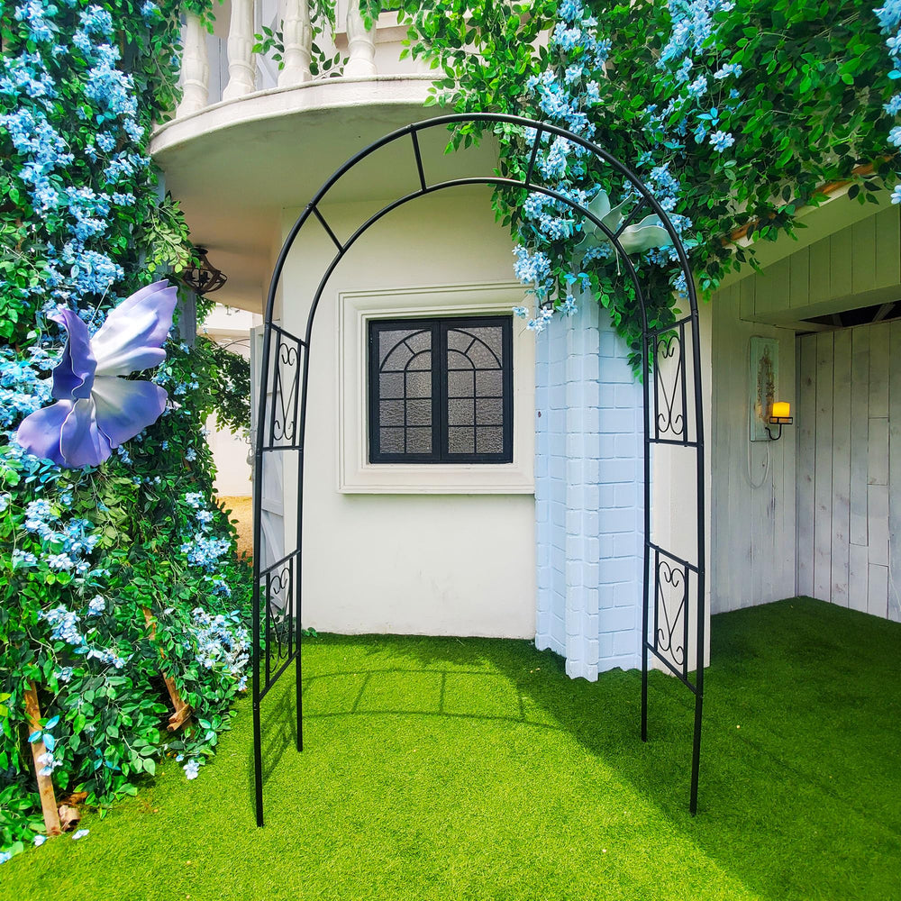 Flohover arch supporting climbing roses demonstrating plant training benefit