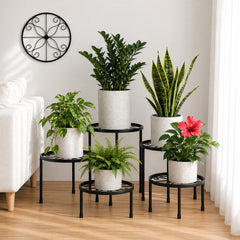 FloriCraft front view of five black metal stands showing graduated heights and stability