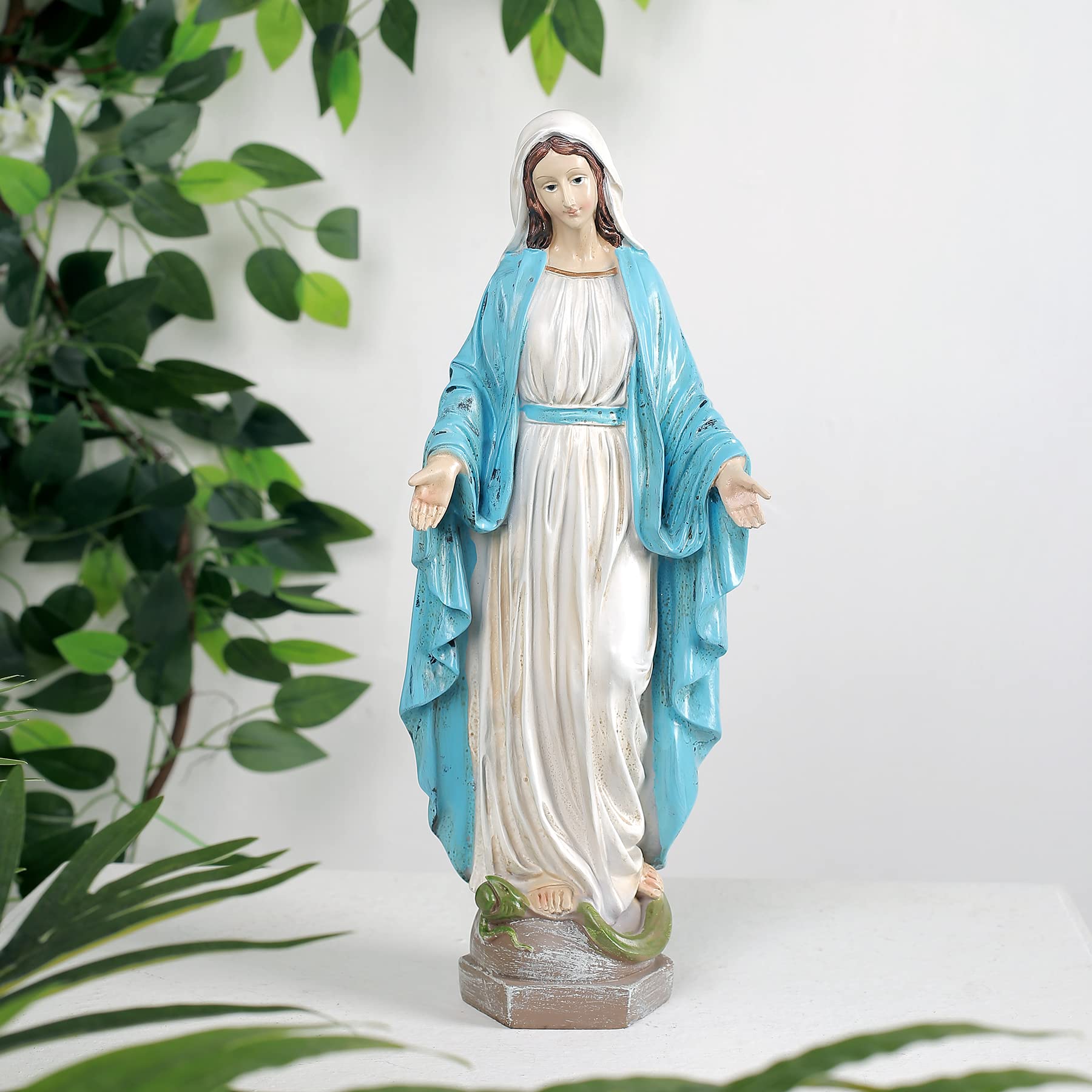 Floryden statue on patio showing serene focal point for relaxation spaces