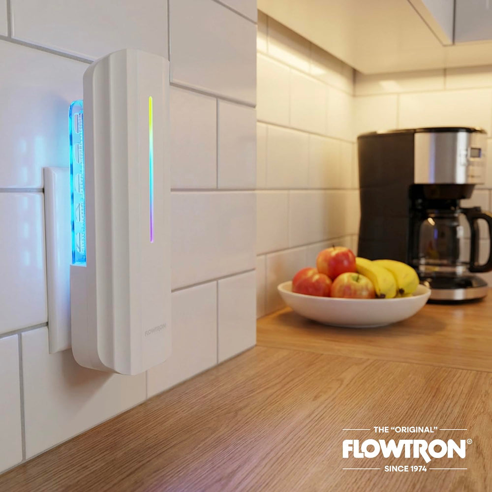 Flowtron mounted on office wall in professional setting minimizing visible pest control