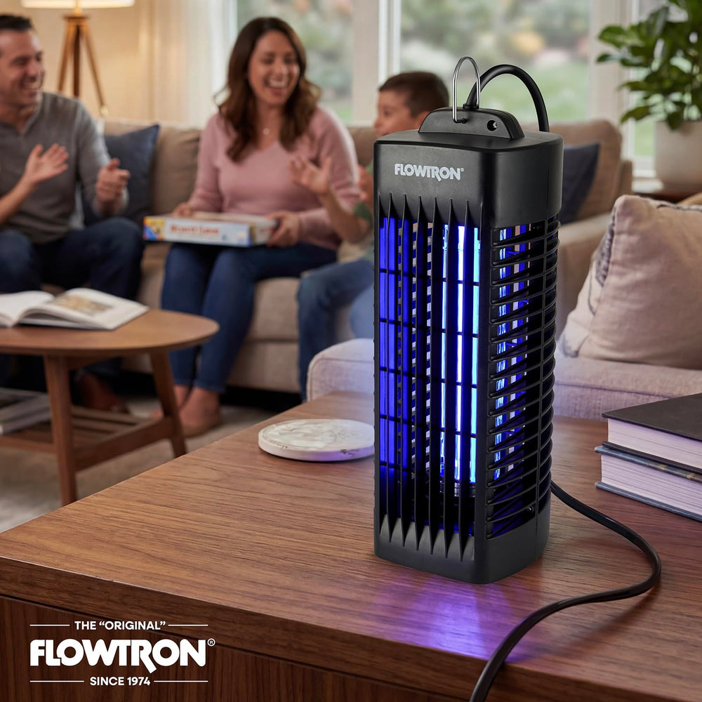 Flowtron held in hand showing slim portable size for easy room-to-room movement