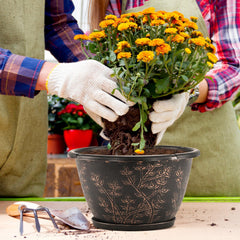Flowyypo drainage holes and saucer detail protecting surfaces and preventing overwatering