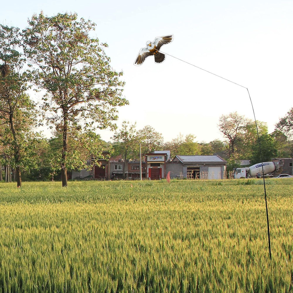 flyonte kite flying over garden showing bird-scaring effect and crop protection benefit