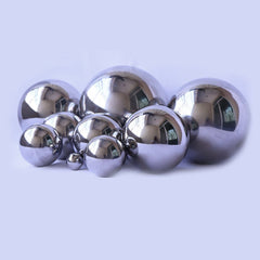 Folytiy floating gazing ball in pond creating shimmering reflections and water interest