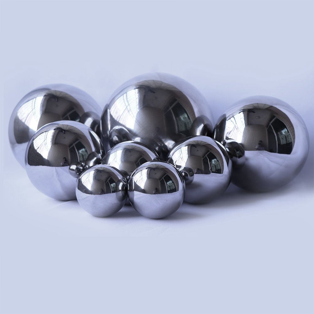 Folytiy gazing ball next to potted plant showing scale and versatile outdoor placement