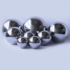 Folytiy gazing ball next to potted plant showing scale and versatile outdoor placement