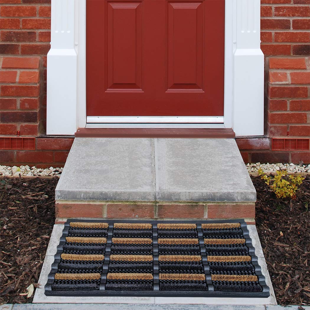 FOOTMATTERS mat in use with boot scraping off mud, prevents indoor tracking