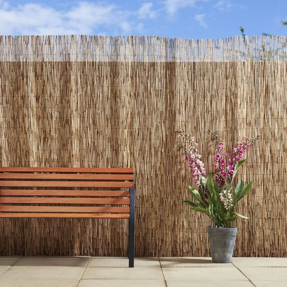 FOREVER BAMBOO reed fencing in a patio setting creating privacy and relaxed style